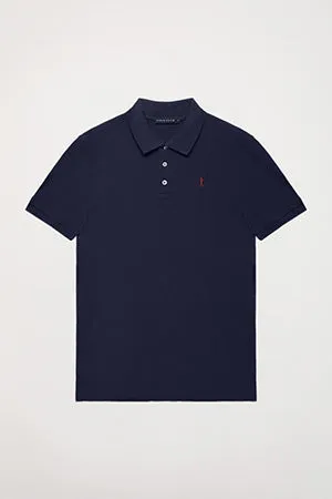 Polo azul marino piqué con tapeta de tres botones y logo bordado Rigby Go