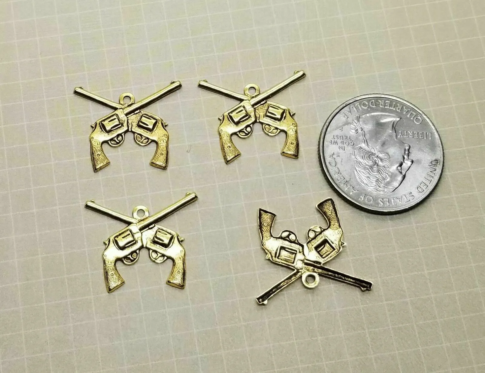 Small Brass Crossed Gun Charms x 4 - 1520WRRAT.